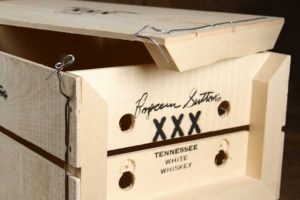 Popcorn Sutton's XXX Tennessee White Whiskey, rough finish package
